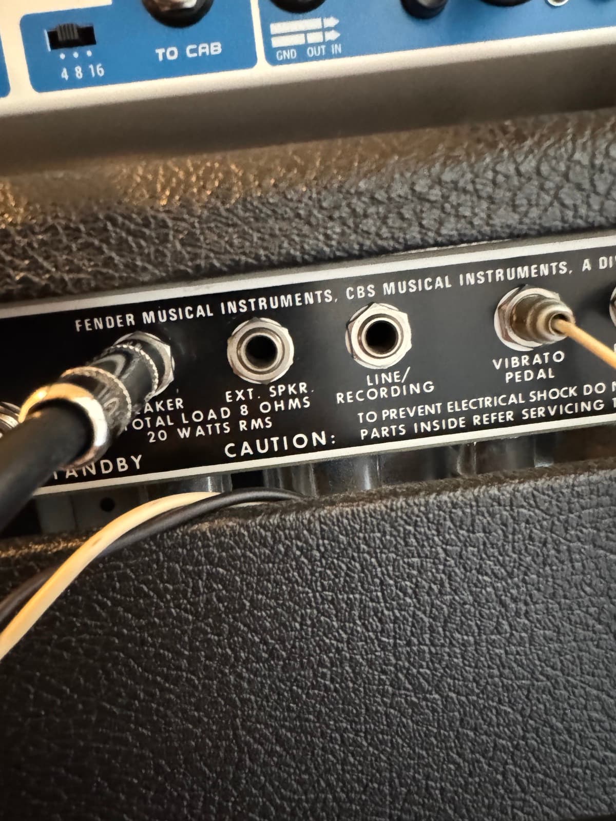 The Fender Deluxe Reverb's rear panel — its speaker output feeds the React:IR's "TO CAB" input, with the load box's impedance selector set to match